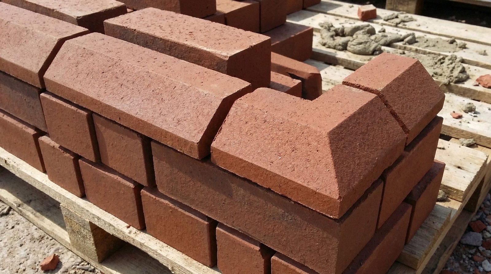 Plinth bricks at the base of a wall
